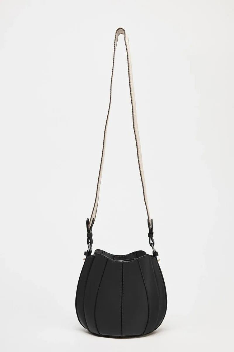 Black shoulder bag with a long strap on a white background