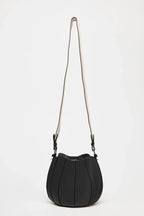 Black shoulder bag with a long strap on a white background