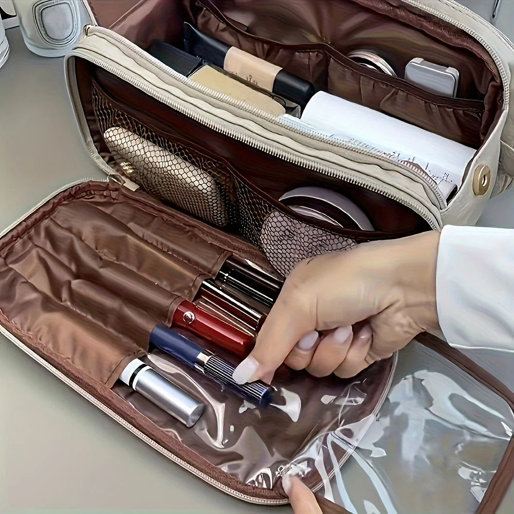 Hand reaching into a makeup bag with various cosmetic items