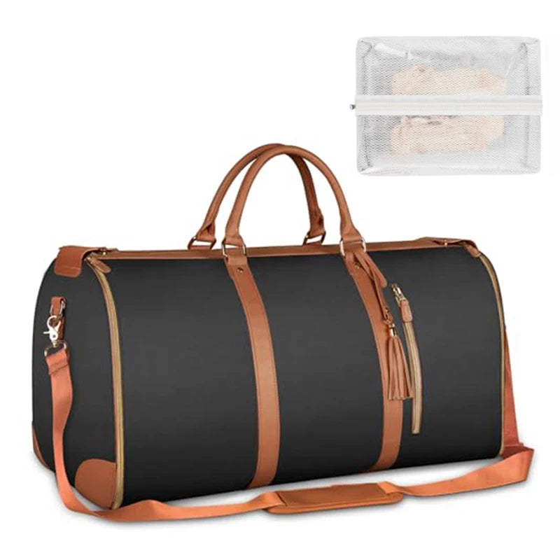 Black duffel bag with brown leather straps and a clear mesh travel organizer on a white background