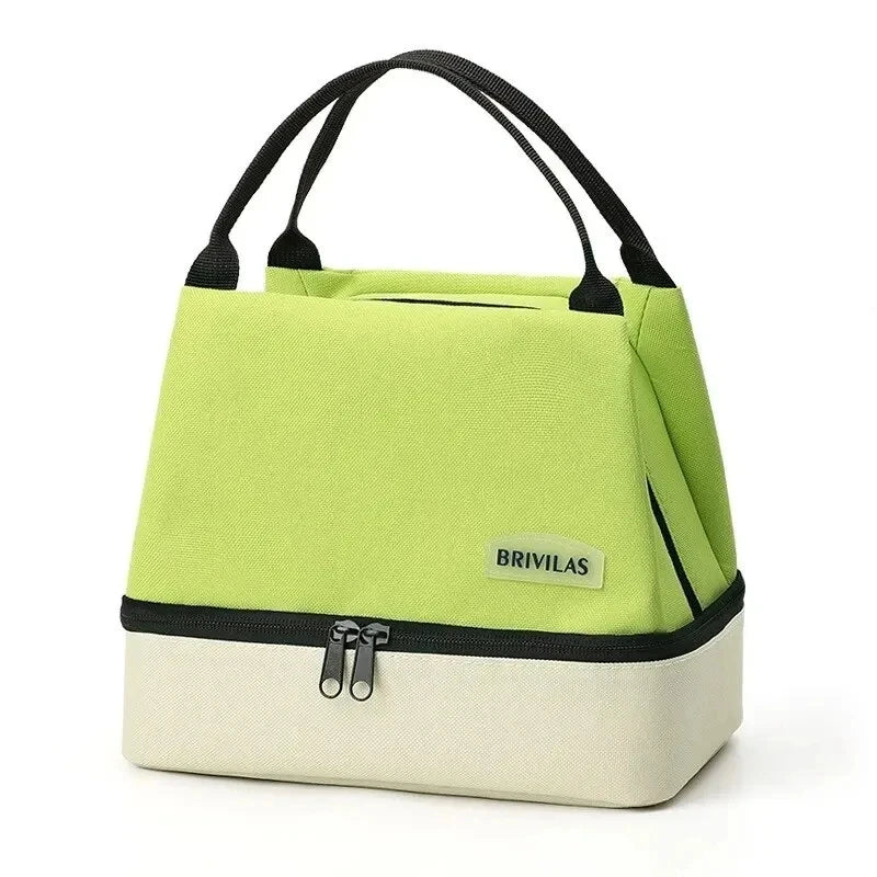 Green and beige insulated lunch bag with black handles on a white background