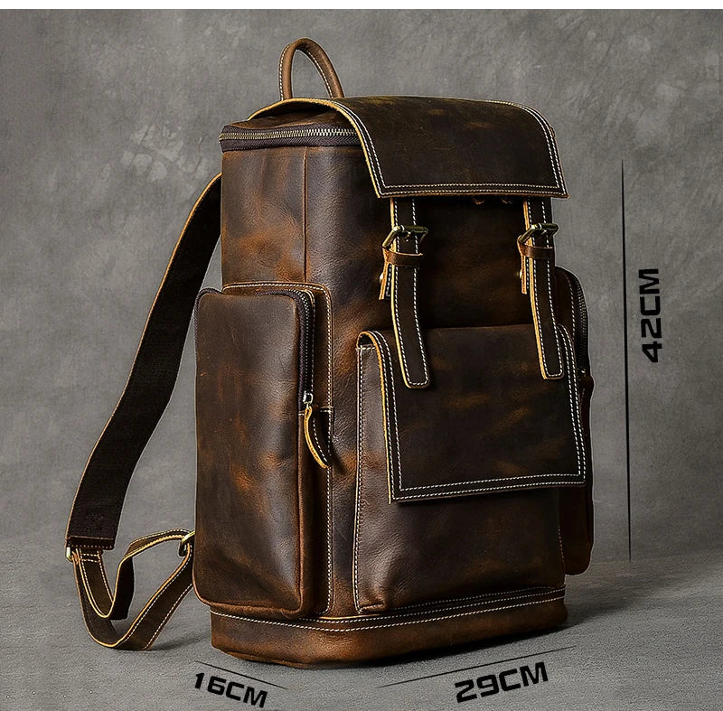 Brown leather backpack on a gray background with measurements indicated.