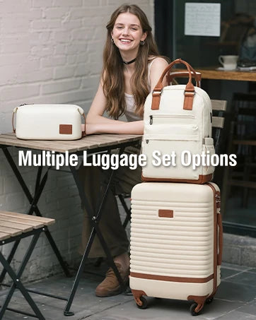 Woman sitting at a table with multiple luggage sets in front of her.