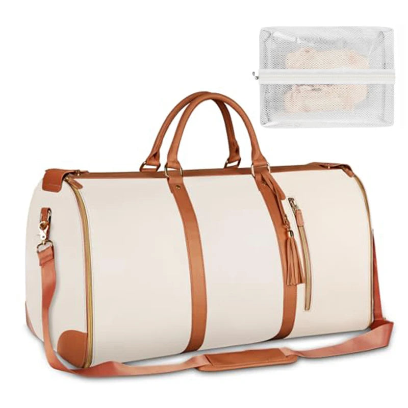 Beige duffel bag with brown handles and straps on a white background