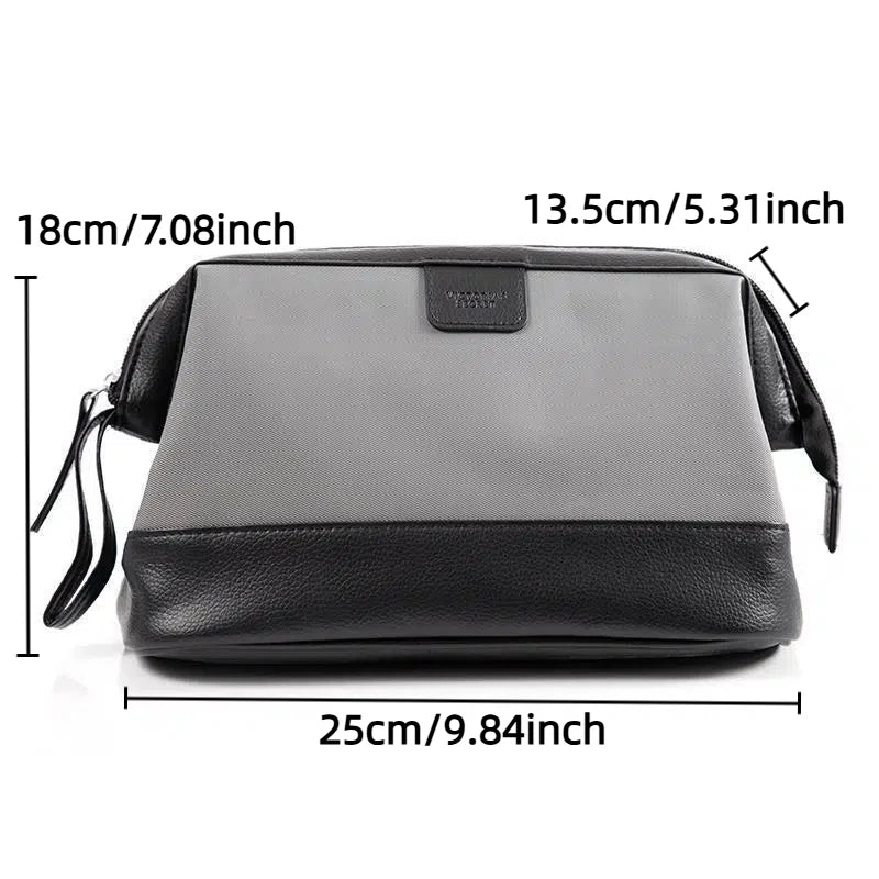 Gray and black toiletry bag with measurements on a white background