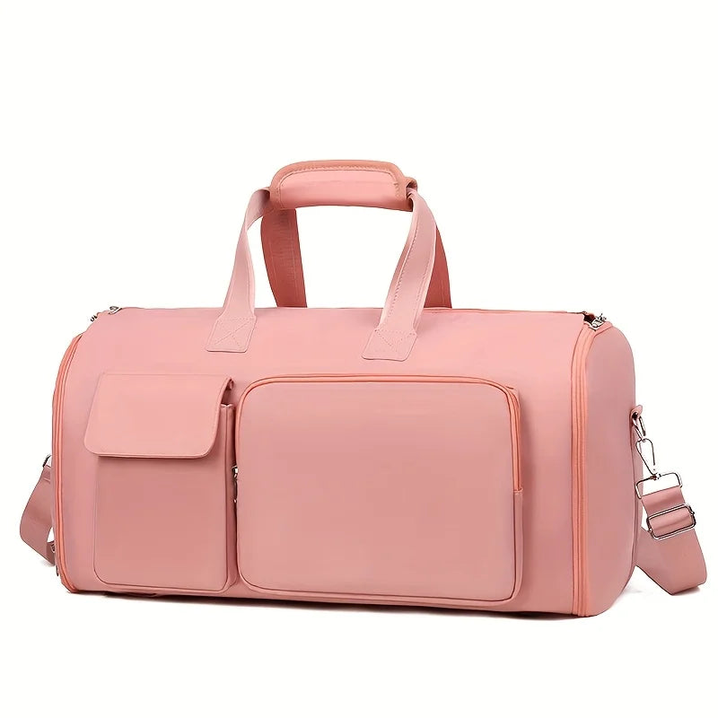 Pink duffel bag with a shoulder strap on a white background